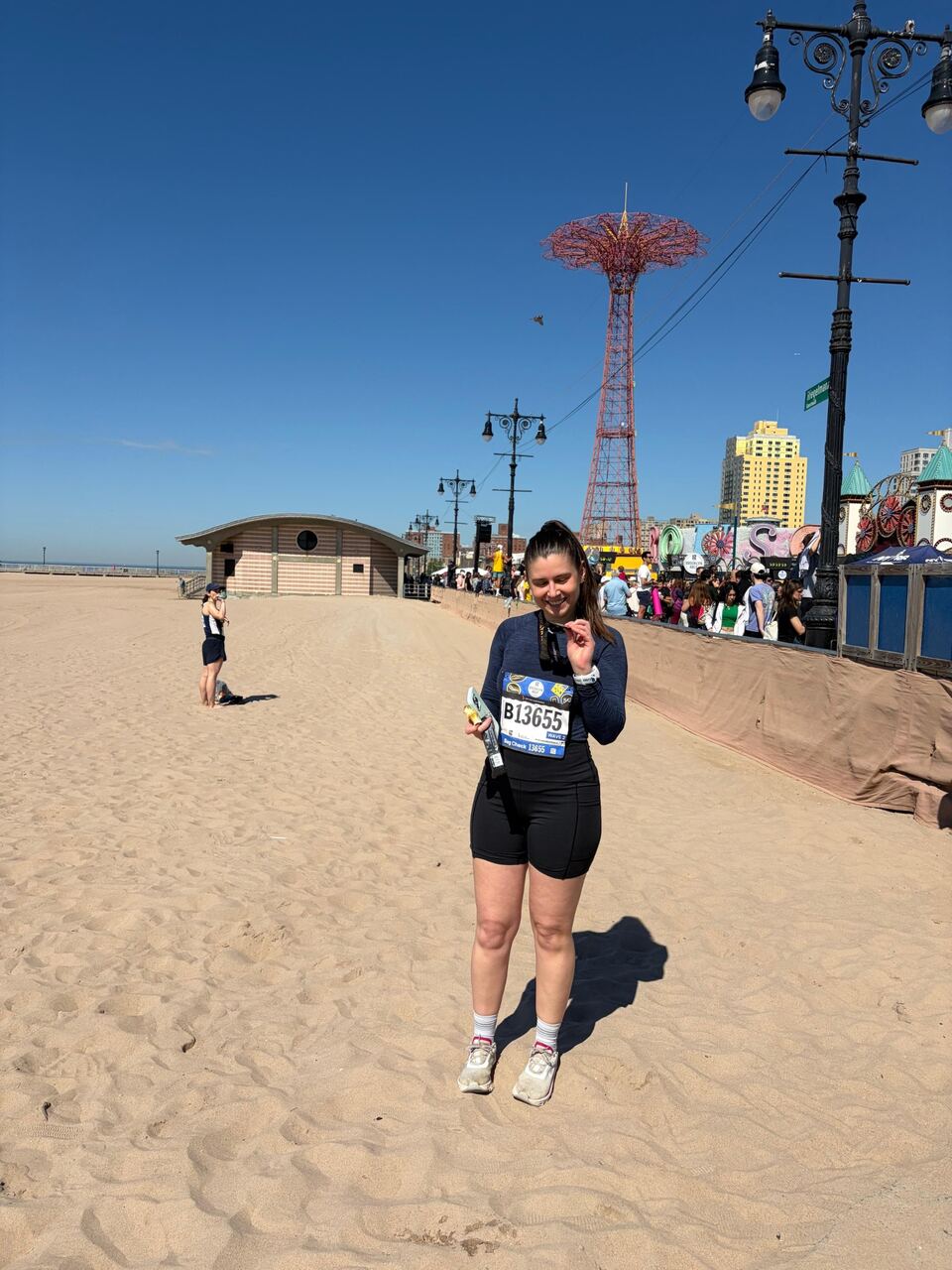 Amélie Gressier with her medal after the 2026 Brooklyn Half